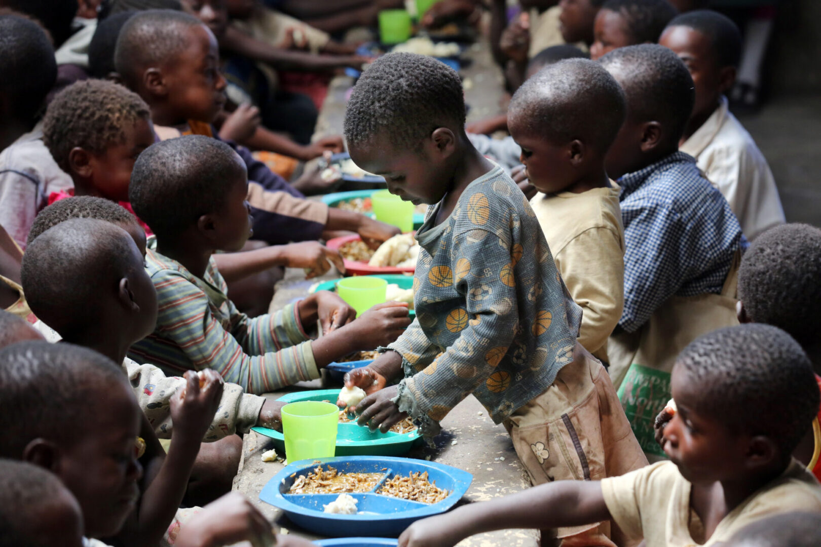 EW58DG Feeding for orphans in a center run by the catholic church, Township Chifubu in Ndola, Zambia, Africa